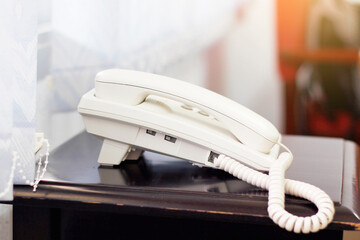 close up on telephone devices at office desk.