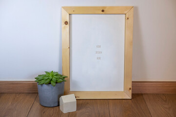 A wooden blank frame on the floor