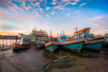 Fototapeta na wymiar Fishing port and beautiful sky in Asia.
