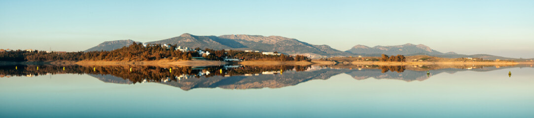 Obraz premium panorama landscape in Orellana with mountains mirroring in lake