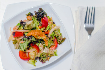 Salmon and beans salad with vegetables