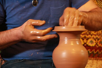 The master making soil water jug ​​in Cappadocia