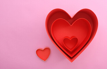 many red hearts one inside the other, the concept of growing big love