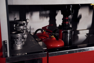 Inside of fire truck. Close up view of equipment and hoses