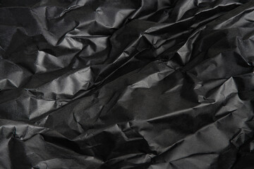 Artfully Crumpled Black Paper Background