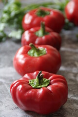 small red peppers, red peppers lined up in a line, red vegetables