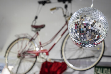 hair salon decoration, disco ball, hanging bicycle
