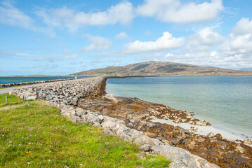 Fototapeta na wymiar The causeway connecting Eriskay and South Uist islands, Outer Hebrides, Scotland, UK