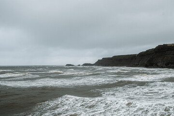 waves crashing on rocks