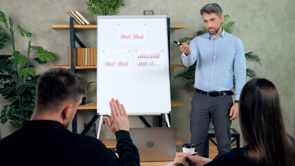 Businessman owners CEO asks question top manager company on implementation annual financial targets. Man employee offline online reports tells investors enterprise indicators marketing activities