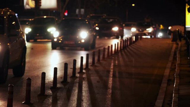 Rush hour traffic and moving creative shadows at Istanbul Bagdat Street at night time
