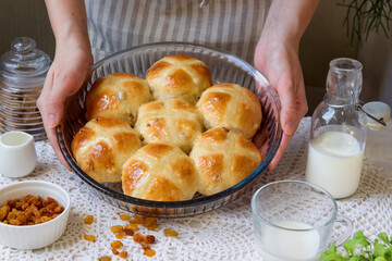 Homemade Easter buns with raisins.