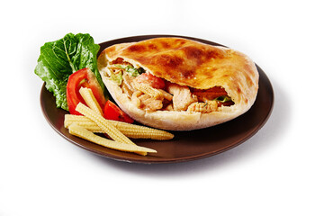 Close up of flatbread pita withwith vegetables and meat at white isolated background. Fried ohnny cake. Eastern cuisine. Asia flapjack. Rustic stile.