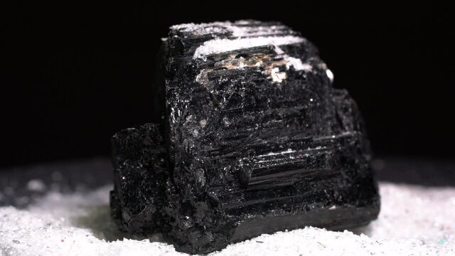 A Tourmaline gemstone filmed in a high-resolution in the studio in 4K