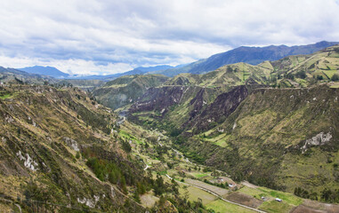Fototapeta na wymiar Beautiful cultivated valley in the Rio Toachi Canyon along the Quilotoa Loop Trek, Quilotoa, Ecuador