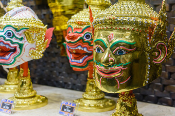 Traditional golden Thai masks for sale, Thailand