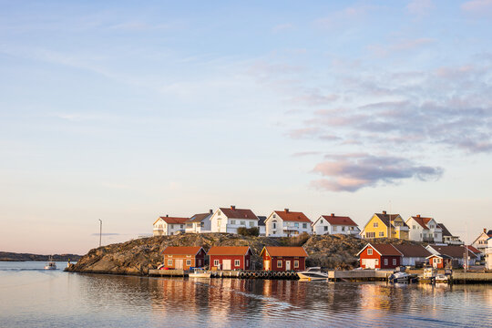 A beautiful cityscape of the fisherman village, Kl&auml;desholmen, in the sunset on the Swedish west coast, Sweden