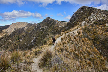 Trekking to Monte Juyende on the crater rim of Laguna Quilotoa, Ecuador
