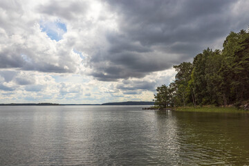 Beautiful Baltic sea view on cloudy sky background. Beautiful summer nature backgrounds. Sweden, Europe.