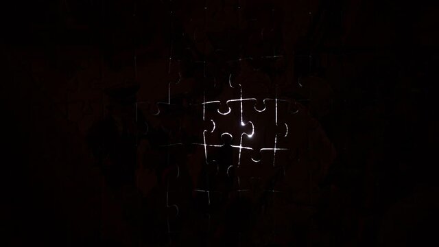 black puzzle pieces silhouette light movement puzzling situation seraching