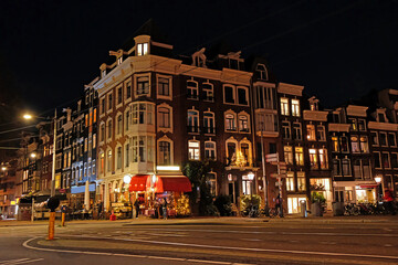 Traditional Amsterdam houses in christmas time in the Netherlands at night