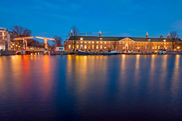 Obraz premium City scenic from Amsterdam by night in the Netherlands