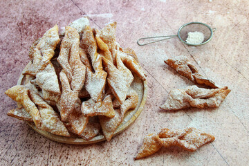 Faworki (angel wings) sprinkled with powdered sugar - traditional Polish carnival delicacy