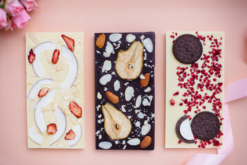 Natural handmade chocolate close-up on a bright background.