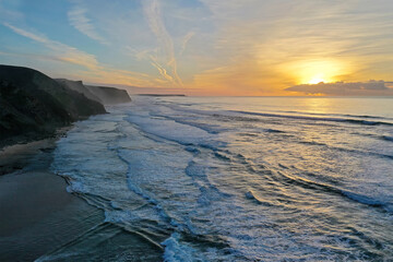 Aerial from Praia Vale Figueiras in Portugal at sunset