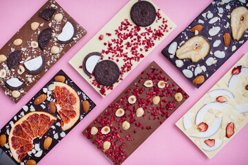 Natural handmade chocolate close-up on a bright background.