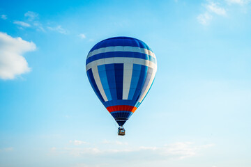 hot blue air balloon in sky