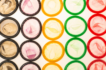 Colorful condoms background.