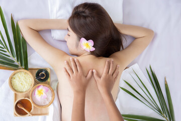 Obraz na płótnie Canvas Top View of Asian Woman Having Back Massage