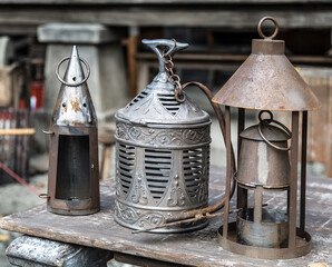 Vintage lanterns for sale at a flea market