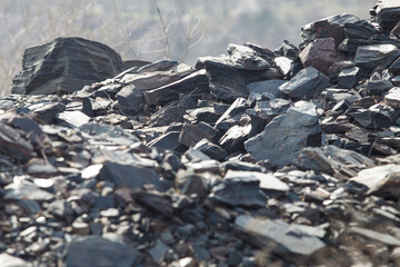 Graystone debris in a slide on a sunny day