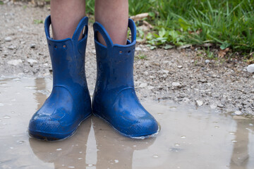 Blue Boots in a Puddles