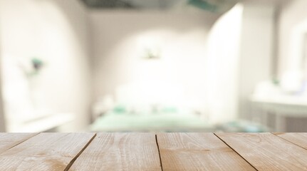 Wooden empty table top on blur background