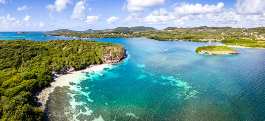 Paradise beach and bay in Carribean archipelago in Antilles with transparent turquoise sea water...
