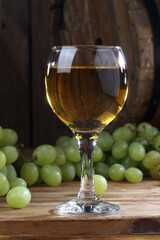 Still life with white wine and grapes