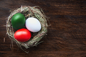 Easter eggs in  color of the Italian flag, Happy Easter holiday Italy card