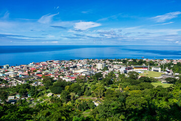 Obraz premium Scenic view of Roseau town and sea, Dominica island. Seen from the small mountain Morne Bruce