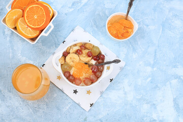 Useful breakfast, fruit salad with grapes, tangerines, banana and slimming jam. The concept of...
