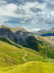 Fototapeta na wymiar Mountain landscape along the road to Stelvio pass (Lombardy) at summer