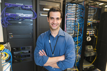 Portrait of technician in network server room