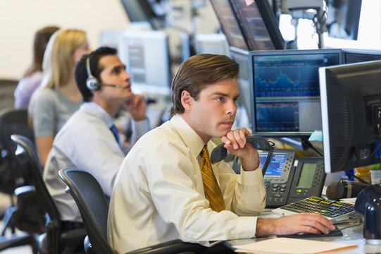 Traders at trading desk
