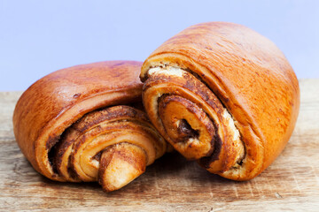fresh bun with a black filling of fragrant cinnamon