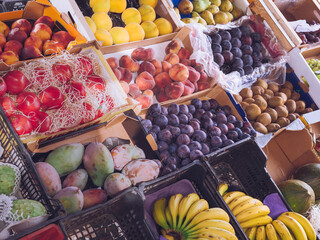 different fresh fruits in a grocery store