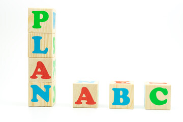word plan made of colored cubes on white background