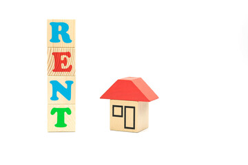 word rent made of colored cubes and small house on white background