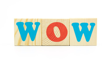 word wow made of colored cubes on white background